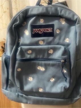 JanSport Light Blue Daisy Backpack